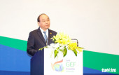 Thủ tướng Nguyễn Xuân Phúc phát biểu khai mạc kỳ họp thứ 6 đại hội đồng Quỹ Môi trường toàn cầu sáng 27-6 - Ảnh: TRƯỜNG TRUNG